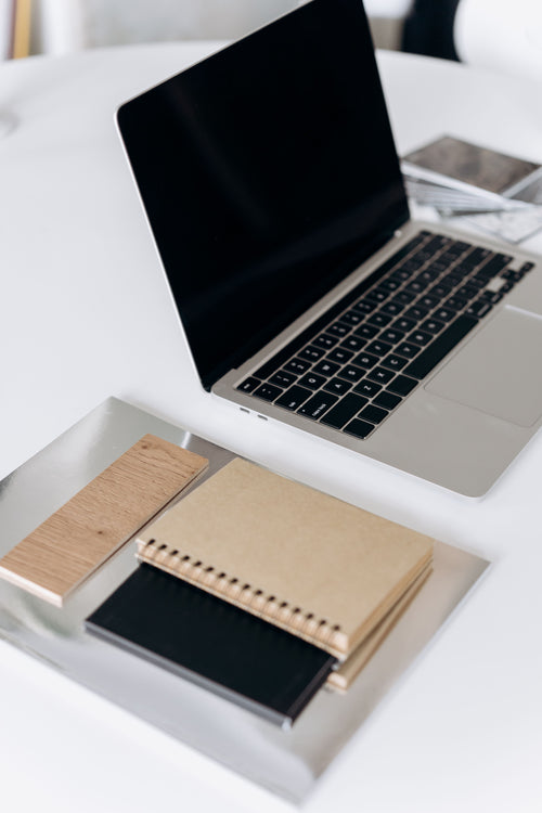 Laptop on a clean desk representing Microsoft 365 Apps for business